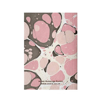 Carnet marbré à la main en rose
